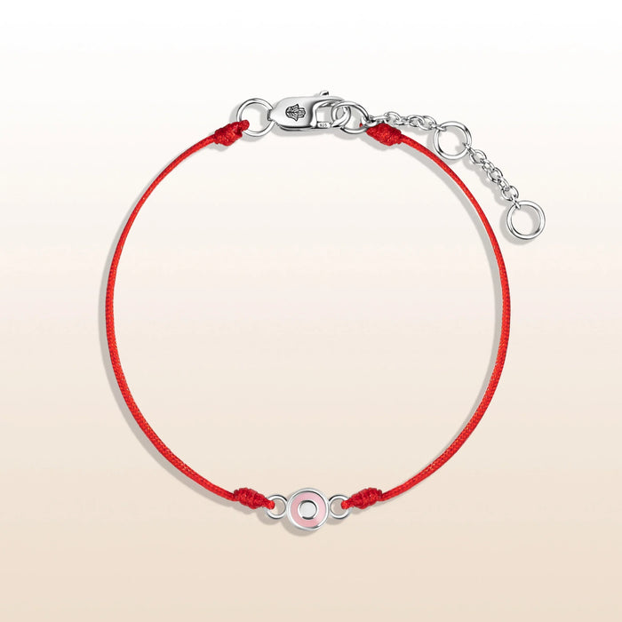 "Protected by Love - Baby Girl Silver Evil Eye Red Bracelet" has the perfect frequencies for your little girl's heart to flourish and grow. A symbol of care and protection, this enchanting Evil Eye charm is sure to add joyful energy to her everyday activities.