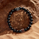 Prosperous Beginnings Garnet Birthstone Bracelet on Black Onyx