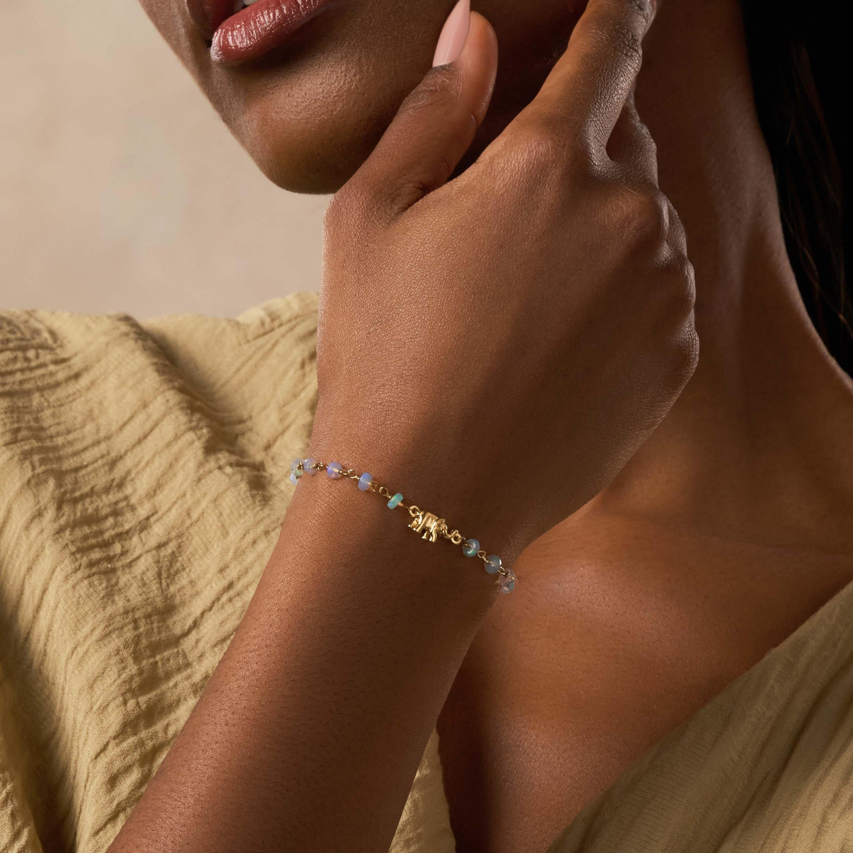 Endless Wisdom 14K Gold Ethiopian White Opal Elephant Bracelet