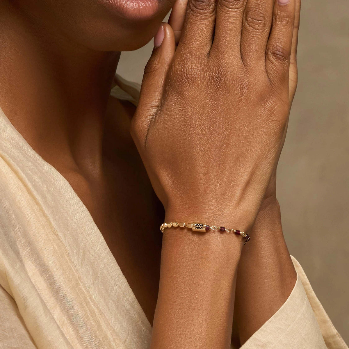 Devoted Humanitarian Aquarius Garnet Bracelet