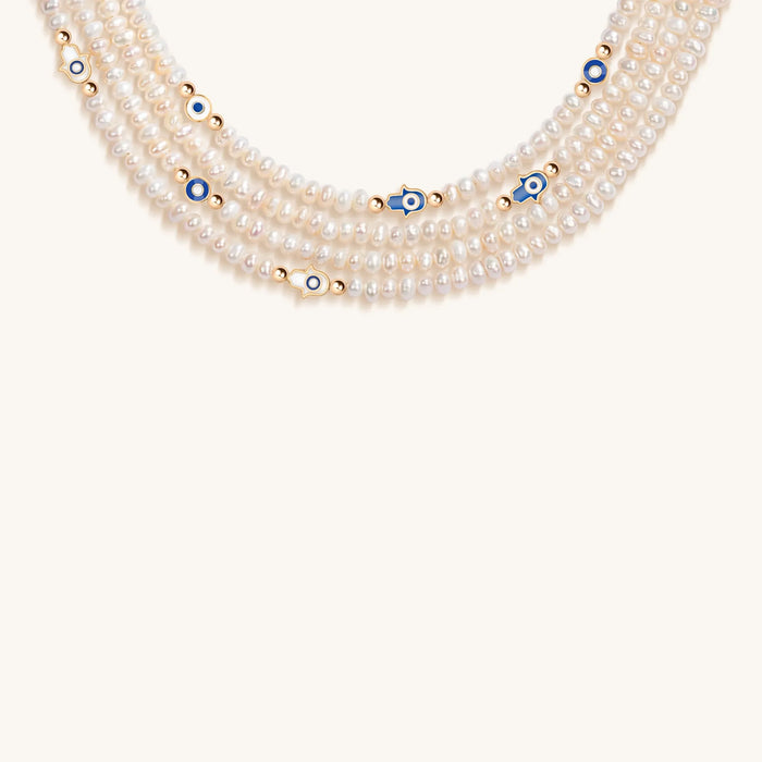 Protective Subtlety - Evil Eye Hamsa Pearl Necklace